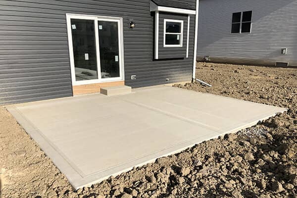 Brushed concrete patio and step square shape